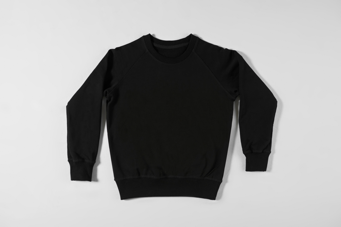 Black sweatshirt on light background
